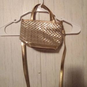 Gold cross body purse